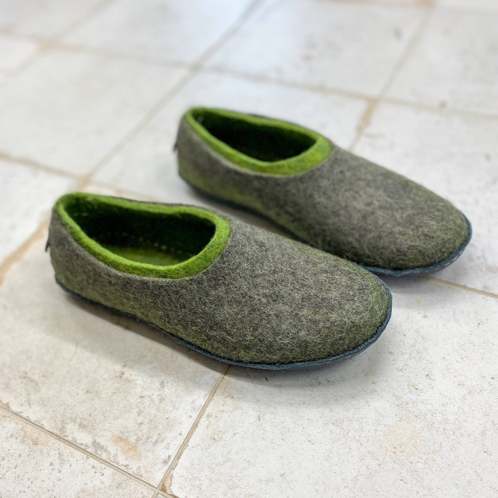 BureBure house slippers for women are 100 % handmade from natural felted wool.