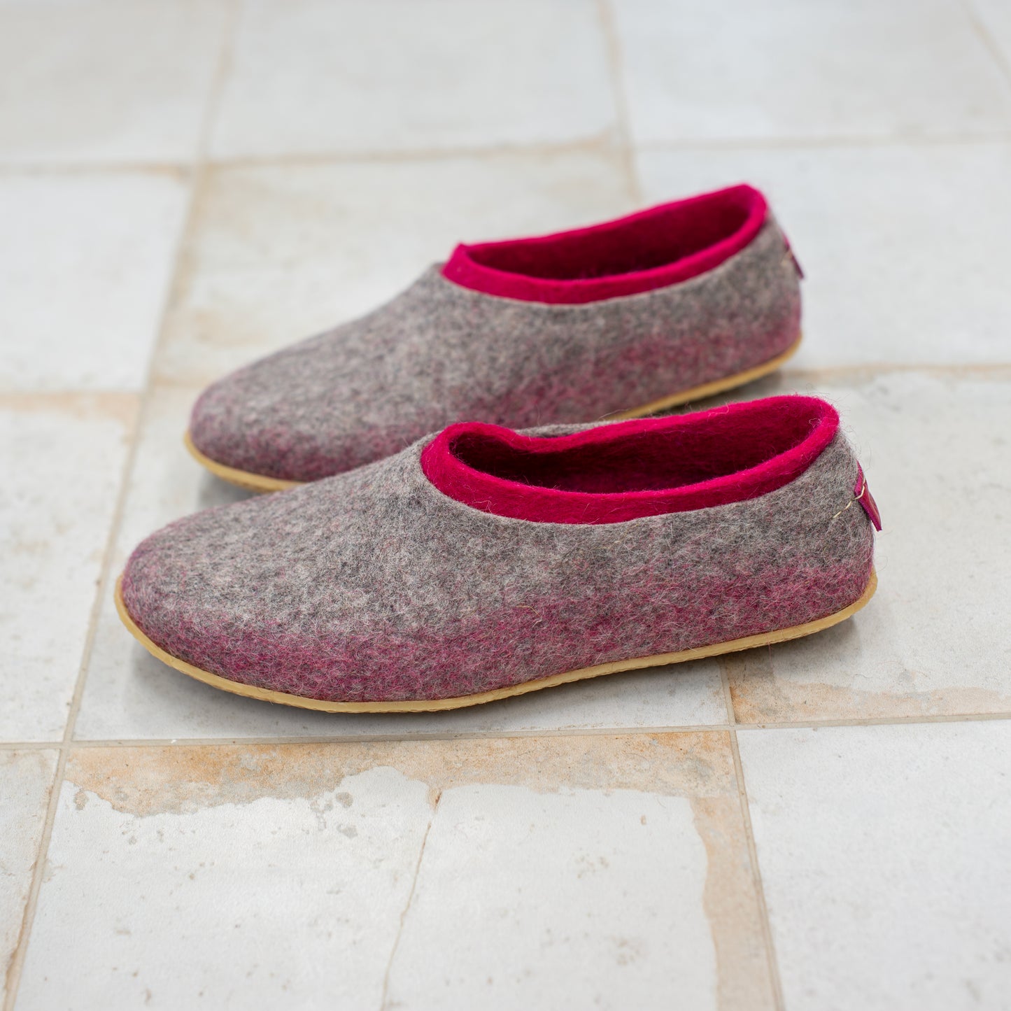 Gray felted wool slippers with purple inner layer for her