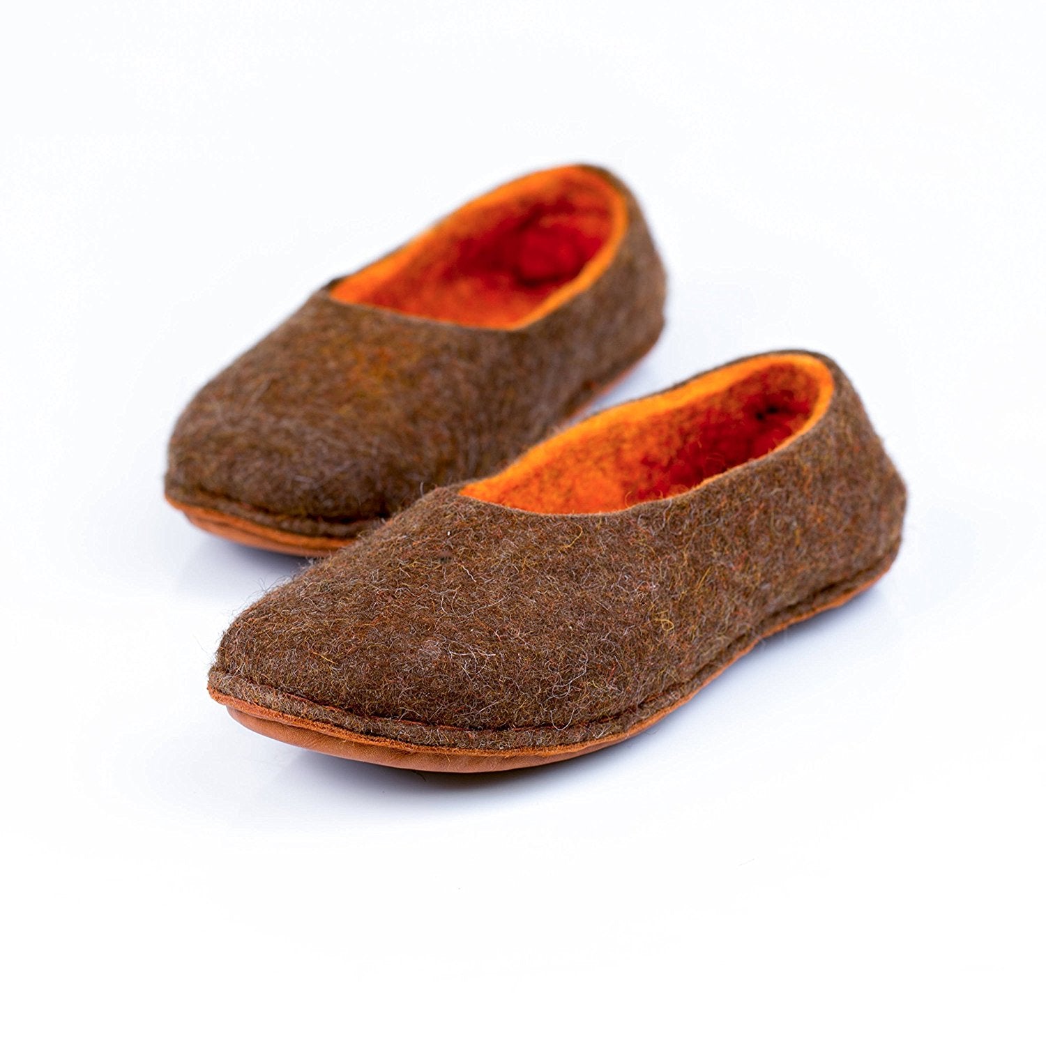 Beige/Orange felted wool slippers that were decorated with alpaca wool