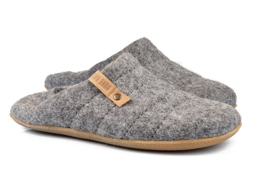 Collapsible felted slippers for men with the backs folded 