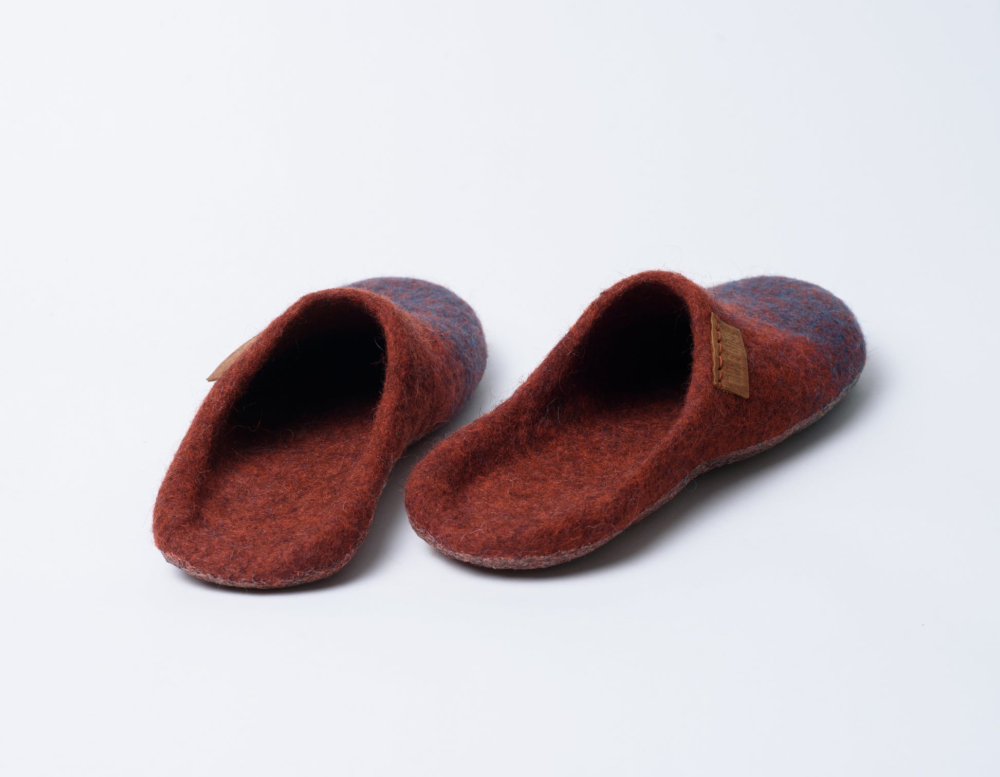 Cinnamon-Turquoise colored backless slip-on slippers from the back