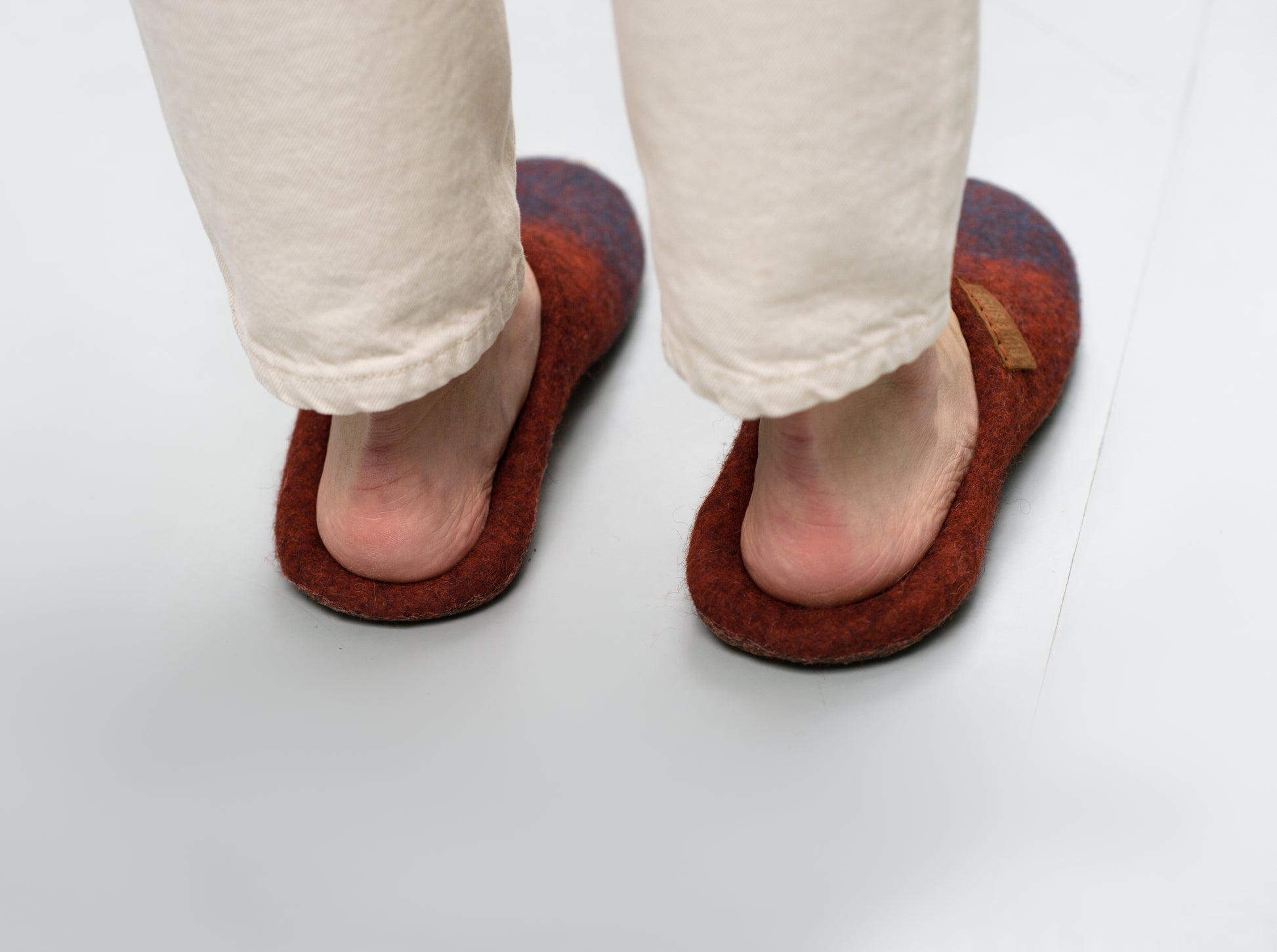 Womens feet in BureBure cinnamon turquoise backless closed toe slippers