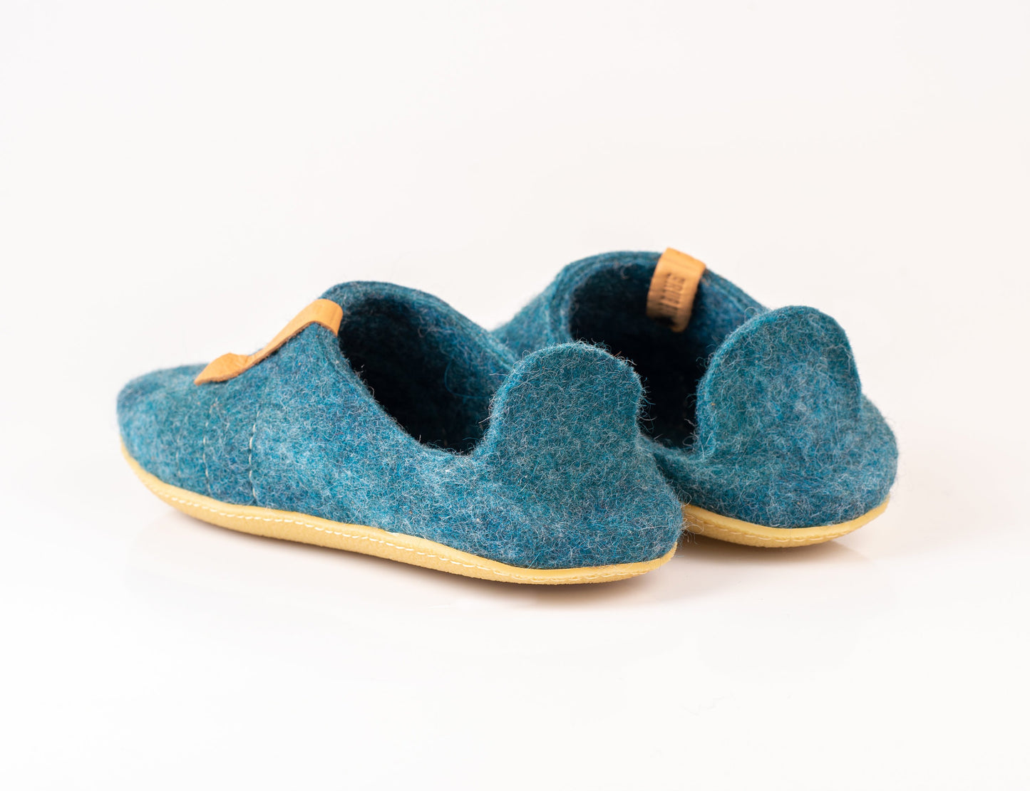 Collapsible felted wool slippers: backless slippers that turn into low-back clogs