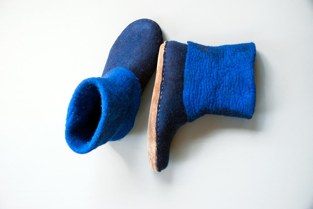 Cork and leather soles on blue felted boots